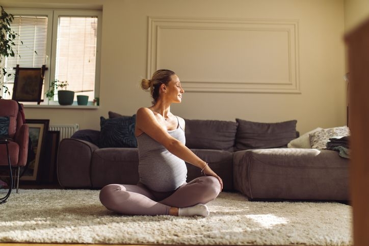 pregnant woman doing yoga