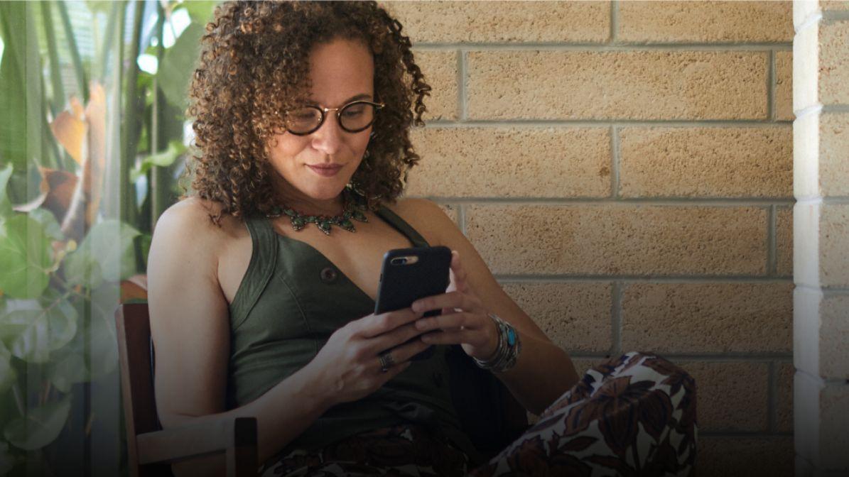 woman on a phone in a terrace